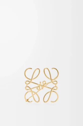 Anagram brooch in metal Gold