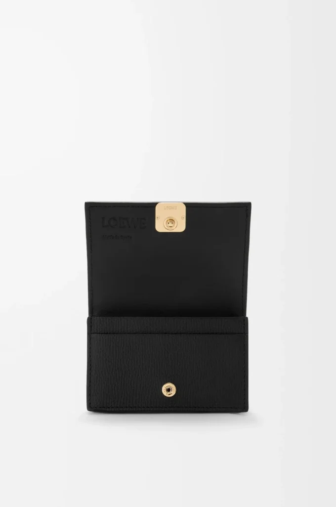 Anagram business cardholder in pebble grained calfskin Black/Gold Anagram business cardholder in pebble grained calfskin Black/Gold