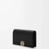 Anagram business cardholder in pebble grained calfskin Black/Gold Anagram business cardholder in pebble grained calfskin Black/Gold