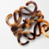 Anagram charm Brown/Black Anagram charm Brown/Black
