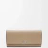 Anagram continental wallet in pebble grained calfskin Sand