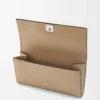 Anagram continental wallet in pebble grained calfskin Sand