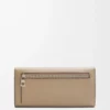 Anagram continental wallet in pebble grained calfskin Sand