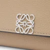 Anagram continental wallet in pebble grained calfskin Sand