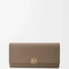 Anagram continental wallet in pebble grained calfskin Taupe