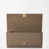Anagram continental wallet in pebble grained calfskin Taupe