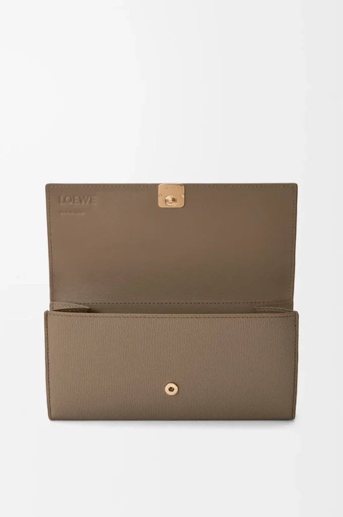 Anagram continental wallet in pebble grained calfskin Taupe