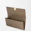 Anagram continental wallet in pebble grained calfskin Taupe