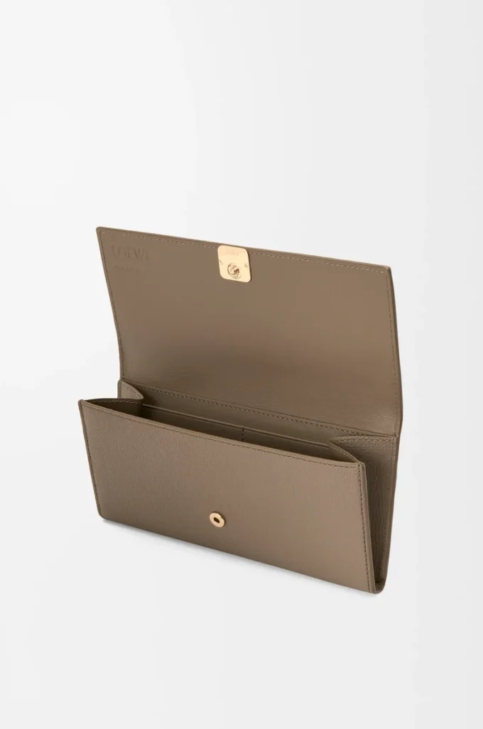 Anagram continental wallet in pebble grained calfskin Taupe