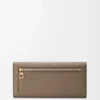 Anagram continental wallet in pebble grained calfskin Taupe