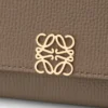 Anagram continental wallet in pebble grained calfskin Taupe