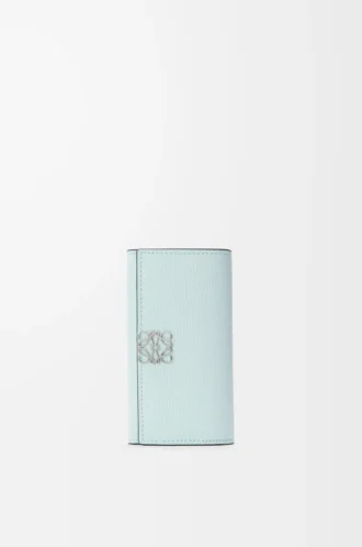 Anagram key case in pebble grained calfskin Frozen