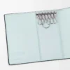Anagram key case in pebble grained calfskin Frozen Anagram key case in pebble grained calfskin Frozen