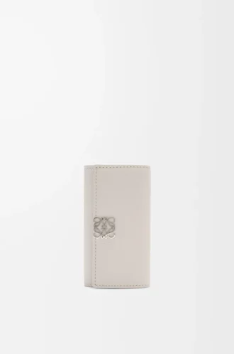 Anagram key case in pebble grained calfskin Light Ghost