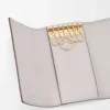 Anagram key case in pebble grained calfskin Light Ghost Grey