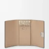 Anagram key case in pebble grained calfskin Sand Anagram key case in pebble grained calfskin Sand