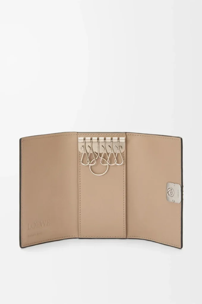Anagram key case in pebble grained calfskin Sand Anagram key case in pebble grained calfskin Sand