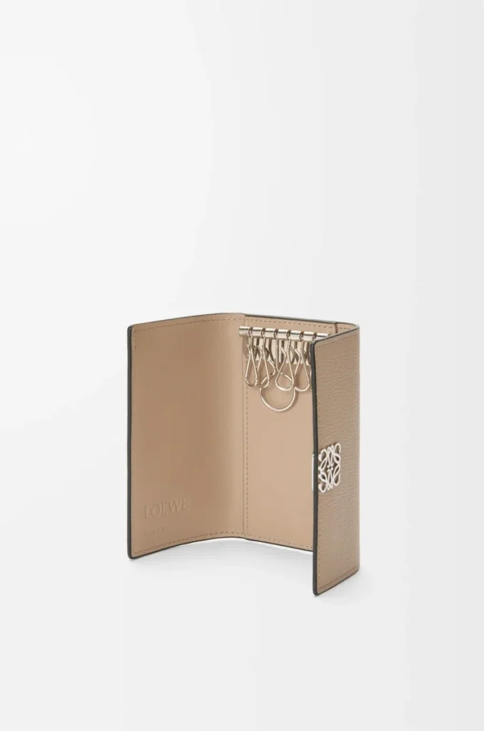 Anagram key case in pebble grained calfskin Sand Anagram key case in pebble grained calfskin Sand