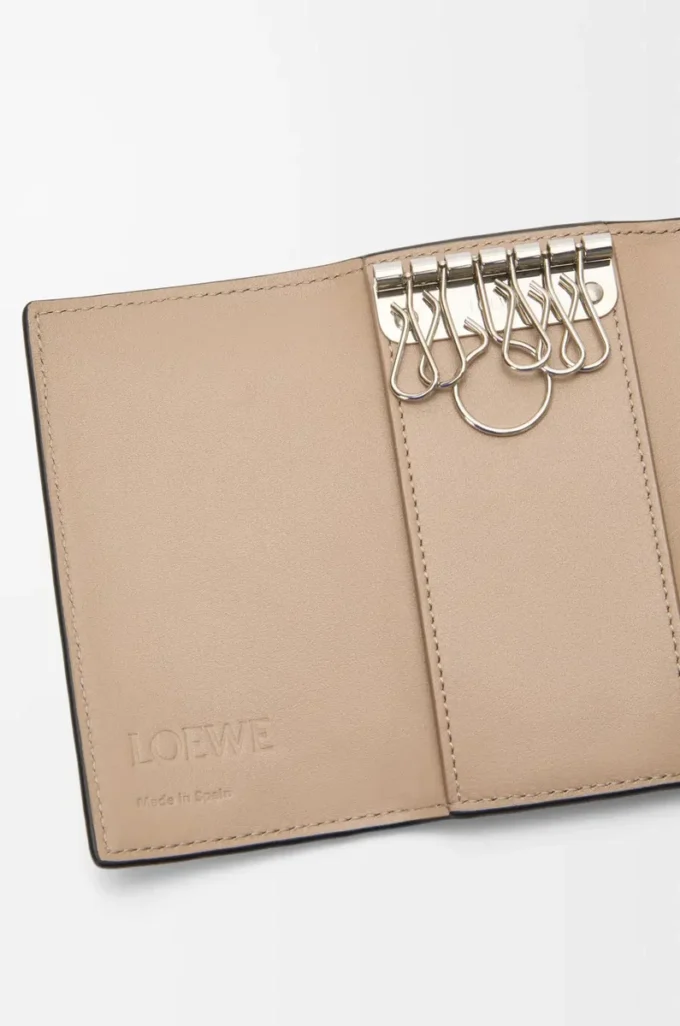 Anagram key case in pebble grained calfskin Sand Anagram key case in pebble grained calfskin Sand