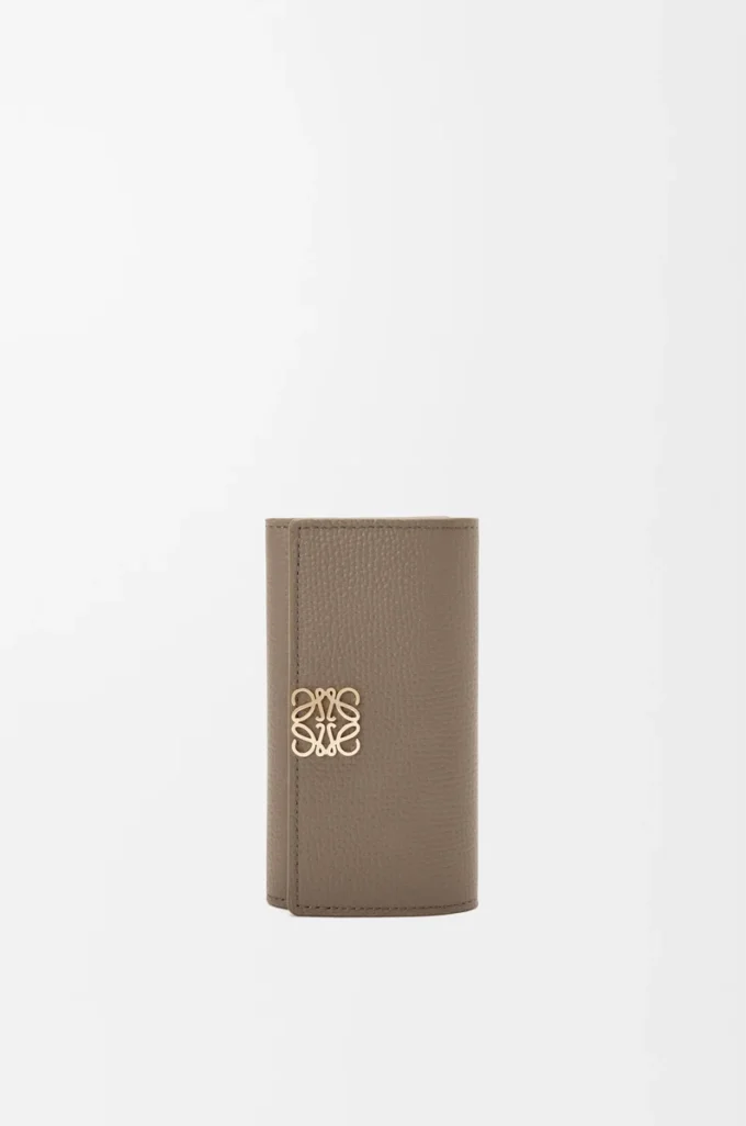 Anagram key case in pebble grained calfskin Taupe Anagram key case in pebble grained calfskin Taupe