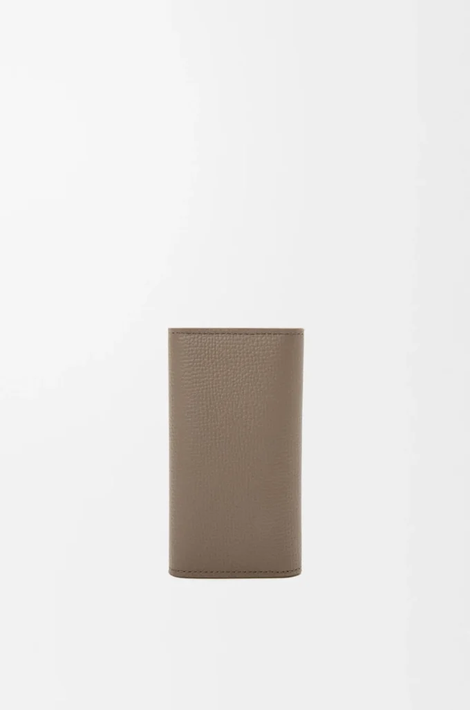 Anagram key case in pebble grained calfskin Taupe Anagram key case in pebble grained calfskin Taupe