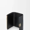 Anagram small vertical wallet in pebble grained calfskin Black/Gold