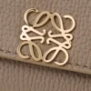 Anagram small vertical wallet in pebble grained calfskin Taupe