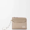 Anagram square coin cardholder in pebble grained calfskin Sand Anagram square coin cardholder in pebble grained calfskin Sand