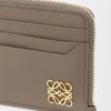 Anagram square coin cardholder in pebble grained calfskin Taupe