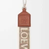 Anagram strap in jacquard and calfskin Natural/Tan/Palladium