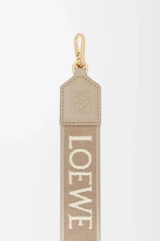 Anagram strap in jacquard and calfskin Sand