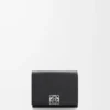 Anagram trifold wallet in pebble grained calfskin Black