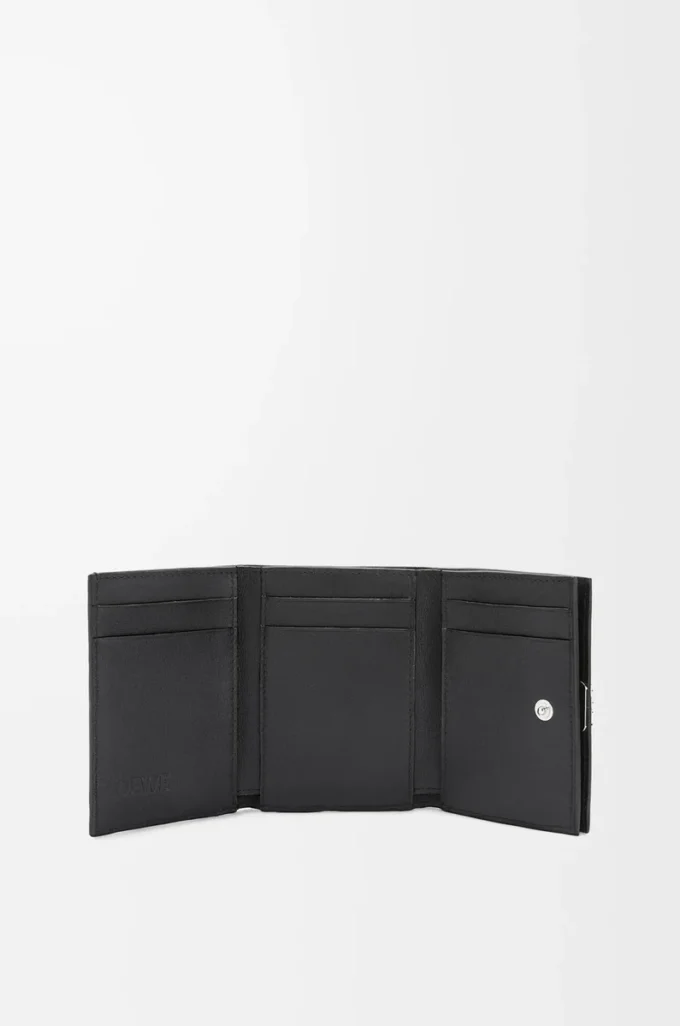 Anagram trifold wallet in pebble grained calfskin Black