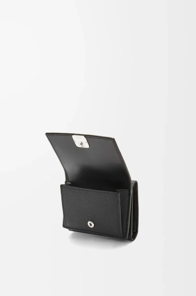 Anagram trifold wallet in pebble grained calfskin Black