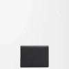 Anagram trifold wallet in pebble grained calfskin Black