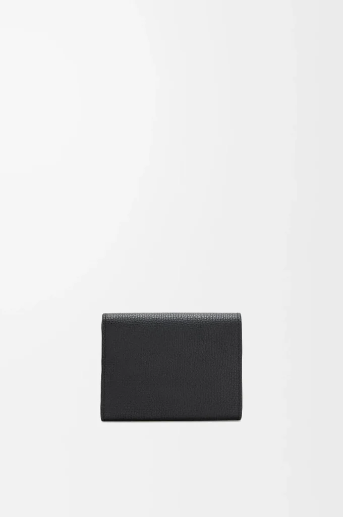 Anagram trifold wallet in pebble grained calfskin Black