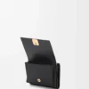 Anagram trifold wallet in pebble grained calfskin Black/Gold