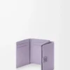 Anagram trifold wallet in pebble grained calfskin Dirty Mauve Anagram trifold wallet in pebble grained calfskin Dirty Mauve