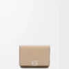 Anagram trifold wallet in pebble grained calfskin Sand Anagram trifold wallet in pebble grained calfskin Sand