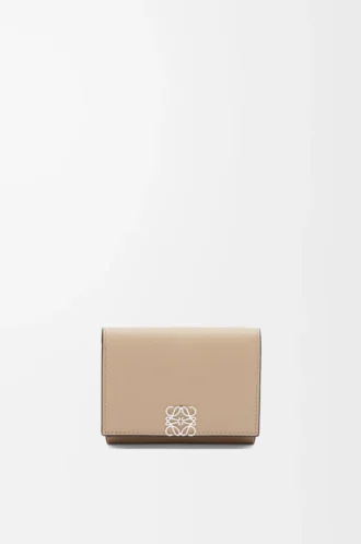 Anagram trifold wallet in pebble grained calfskin Sand