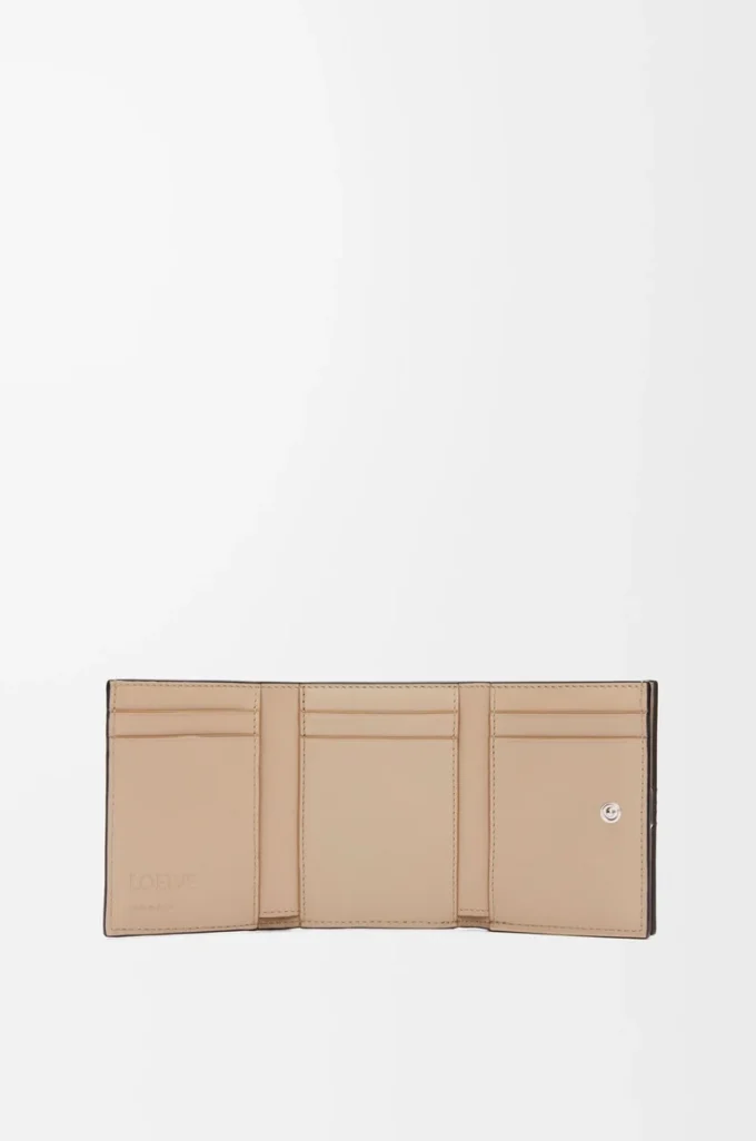 Anagram trifold wallet in pebble grained calfskin Sand Anagram trifold wallet in pebble grained calfskin Sand