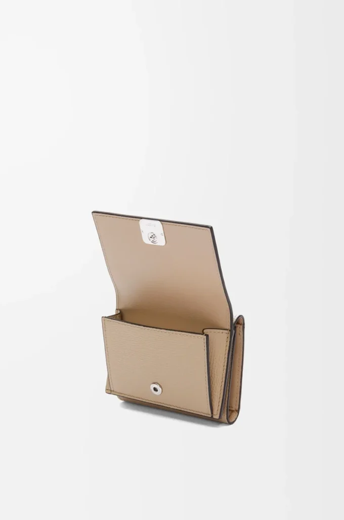 Anagram trifold wallet in pebble grained calfskin Sand Anagram trifold wallet in pebble grained calfskin Sand