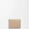 Anagram trifold wallet in pebble grained calfskin Sand Anagram trifold wallet in pebble grained calfskin Sand