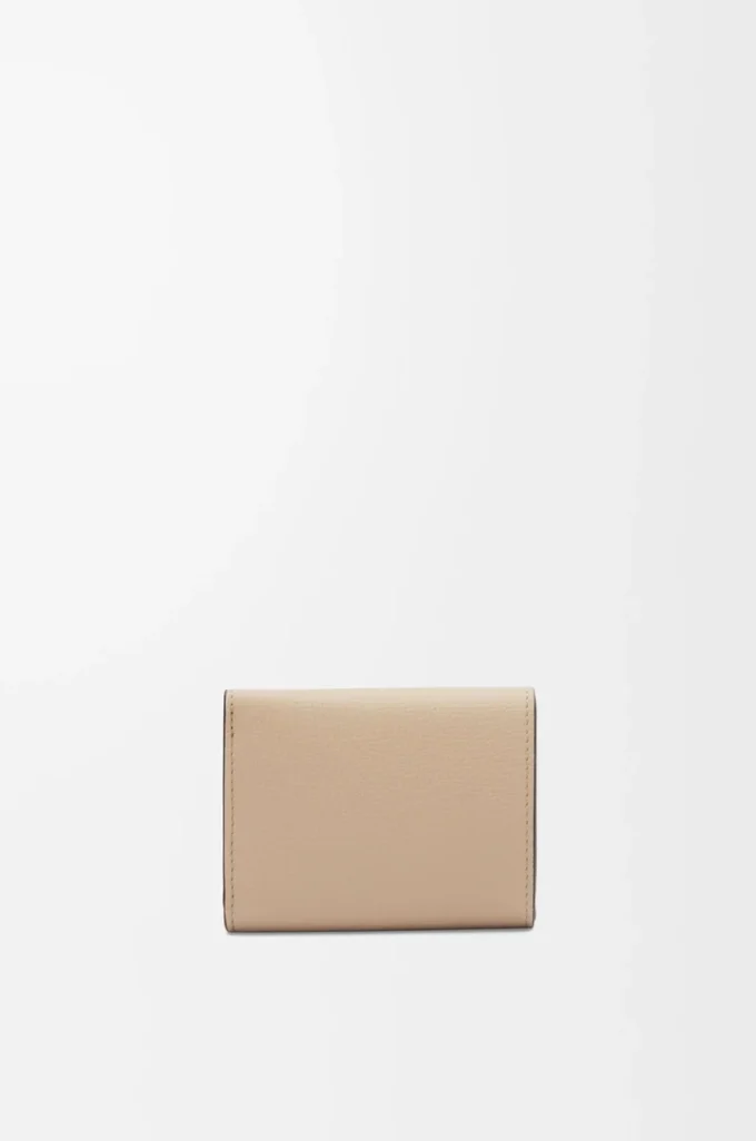 Anagram trifold wallet in pebble grained calfskin Sand Anagram trifold wallet in pebble grained calfskin Sand