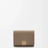 Anagram trifold wallet in pebble grained calfskin Taupe