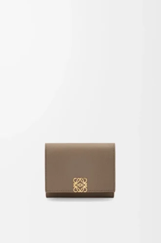 Anagram trifold wallet in pebble grained calfskin Taupe Anagram trifold wallet in pebble grained calfskin Taupe