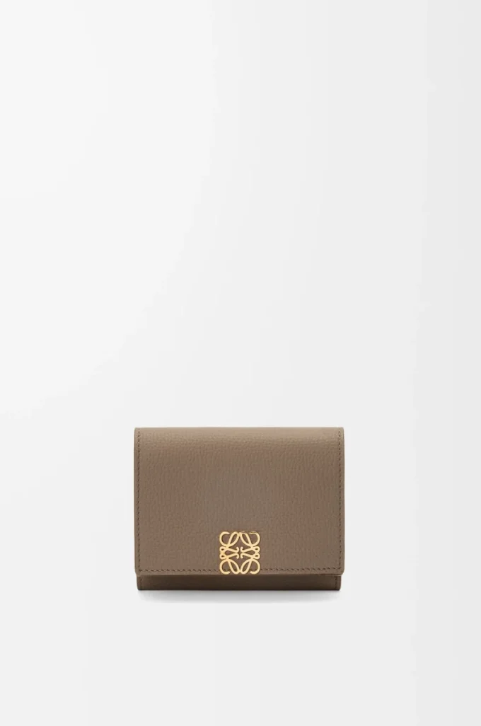 Anagram trifold wallet in pebble grained calfskin Taupe