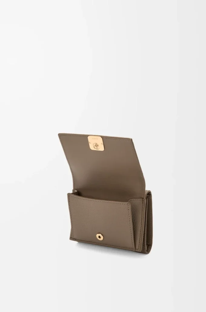 Anagram trifold wallet in pebble grained calfskin Taupe