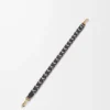 Arrow short strap in calfskin Black/Chocolate Arrow short strap in calfskin Black/Chocolate