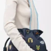 Cats medium Flamenco clutch in embroidered denim Blue Cats medium Flamenco clutch in embroidered denim Blue